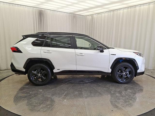 Photo of 2021 Blizzard Pearl/Midnight Black Metallic - 2QJ Toyota RAV4 Hybrid