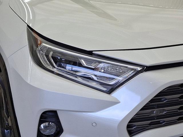 Photo of 2021 Blizzard Pearl/Midnight Black Metallic - 2QJ Toyota RAV4 Hybrid
