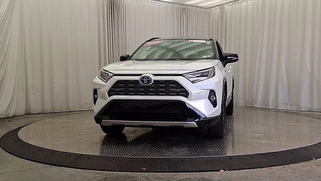 Photo of 2021 Blizzard Pearl/Midnight Black Metallic - 2QJ Toyota RAV4 Hybrid