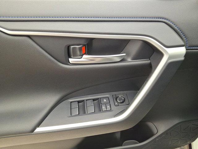 Photo of 2021 Blizzard Pearl/Midnight Black Metallic - 2QJ Toyota RAV4 Hybrid