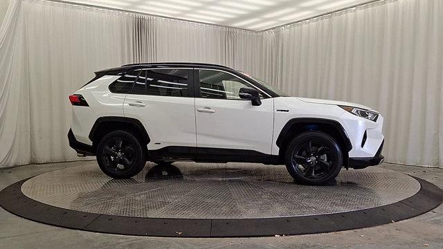 Photo of 2021 Blizzard Pearl/Midnight Black Metallic - 2QJ Toyota RAV4 Hybrid