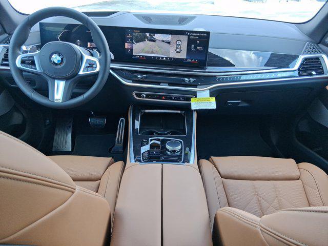 Photo of 2026 Mineral White Metallic BMW X5