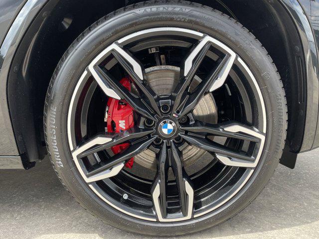 Photo of 2025 Black Sapphire Metallic BMW X4