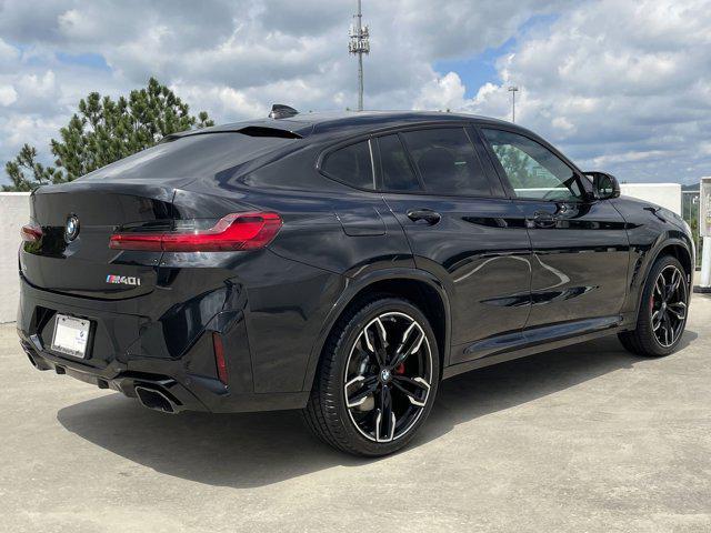 Photo of 2025 Black Sapphire Metallic BMW X4