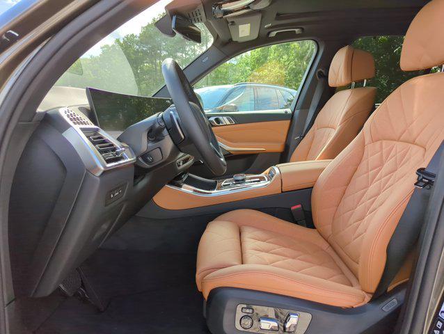 Photo of 2026 Manhattan Green Metallic BMW X5