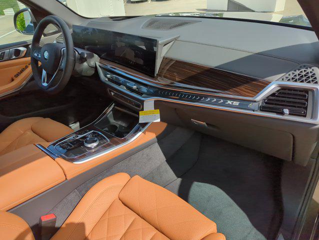 Photo of 2026 Manhattan Green Metallic BMW X5