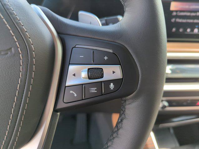 Photo of 2026 Manhattan Green Metallic BMW X5