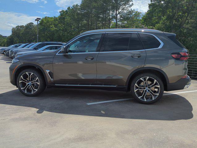 Photo of 2026 Manhattan Green Metallic BMW X5