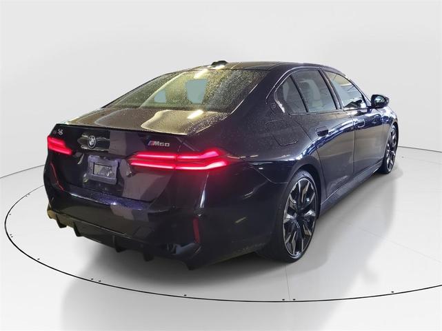 Photo of 2024 Carbon Black Metallic BMW i5