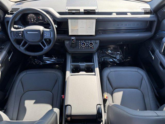Photo of 2025 Tasman Blue Metallic Land Rover Defender