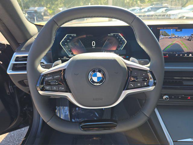 Photo of 2025 Black Sapphire Metallic BMW 230