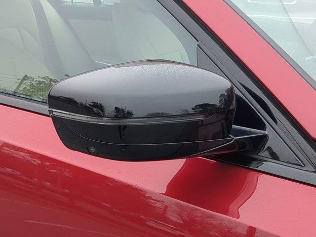 Photo of 2025 Vegas Red Metallic BMW 330