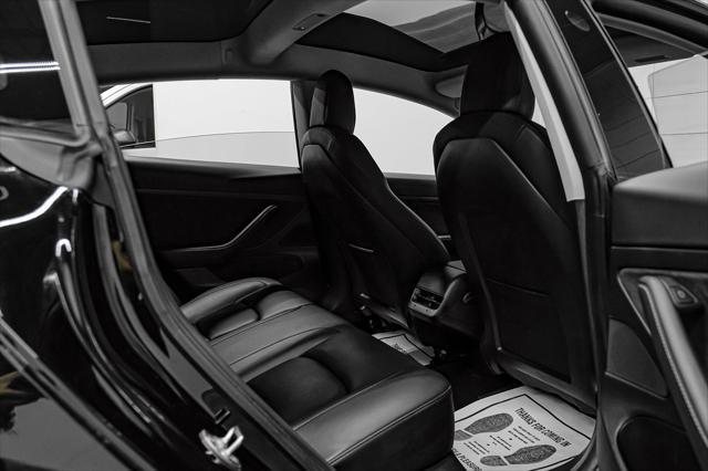 Photo of 2021 Solid Black Tesla Model 3
