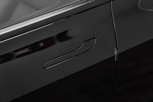 Photo of 2021 Solid Black Tesla Model 3