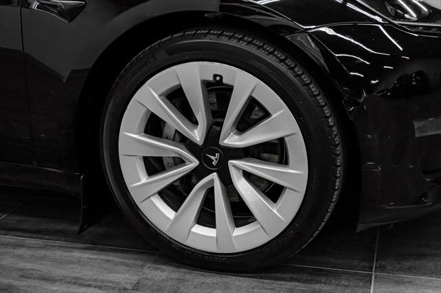 Photo of 2021 Solid Black Tesla Model 3