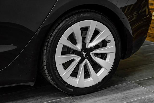 Photo of 2021 Solid Black Tesla Model 3