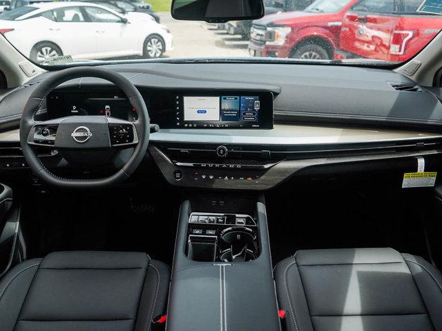 Photo of 2025 Scarlet Ember Tintcoat/Super Black Nissan Murano
