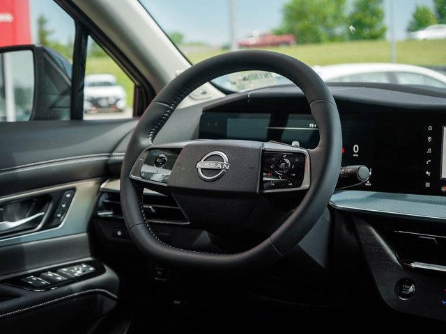 Photo of 2025 Scarlet Ember Tintcoat/Super Black Nissan Murano