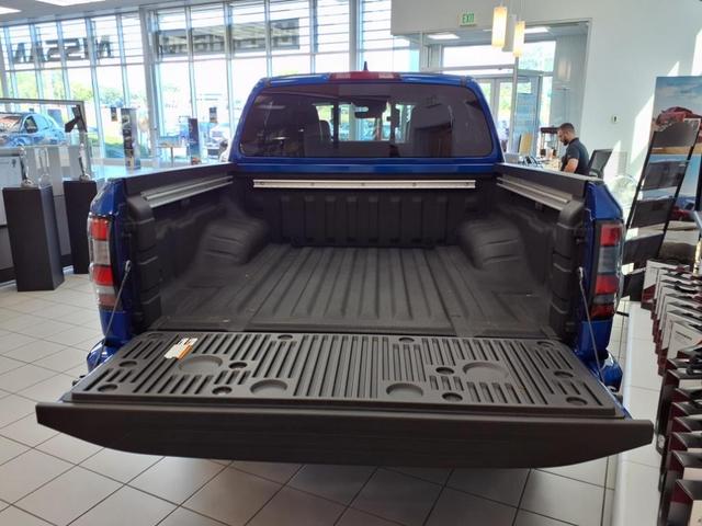 Photo of 2025 Bluestone Pearl Nissan Frontier