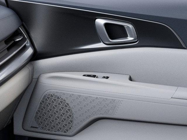 Photo of 2025 White Kia Carnival Hybrid