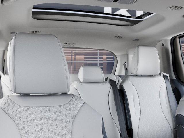 Photo of 2026 White Kia Carnival Hybrid