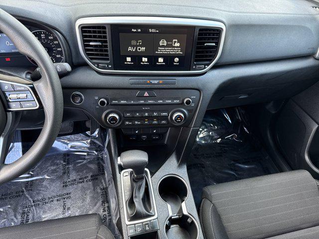 Photo of 2022 Black Cherry Kia Sportage