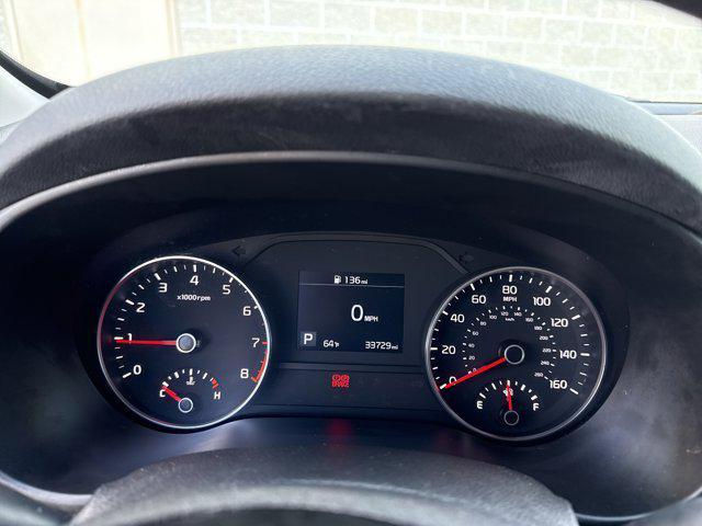 Photo of 2022 Black Cherry Kia Sportage