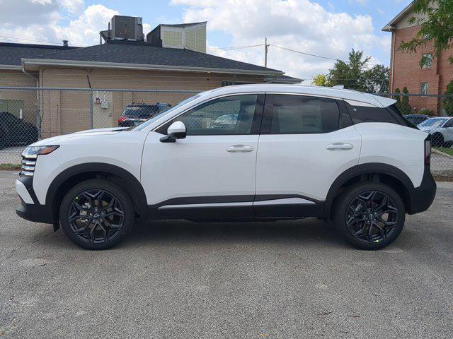 Photo of 2025 Aspen White Tricoat Nissan Kicks