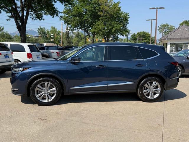 Photo of 2025 Canyon River Blue Metallic Acura MDX