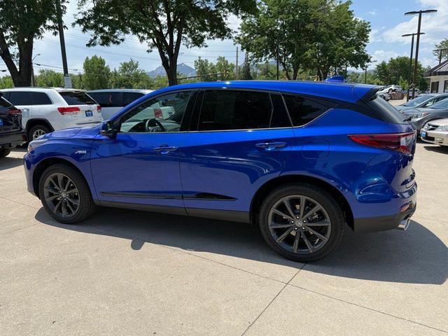 Photo of 2025 Apex Blue Pearl Acura RDX
