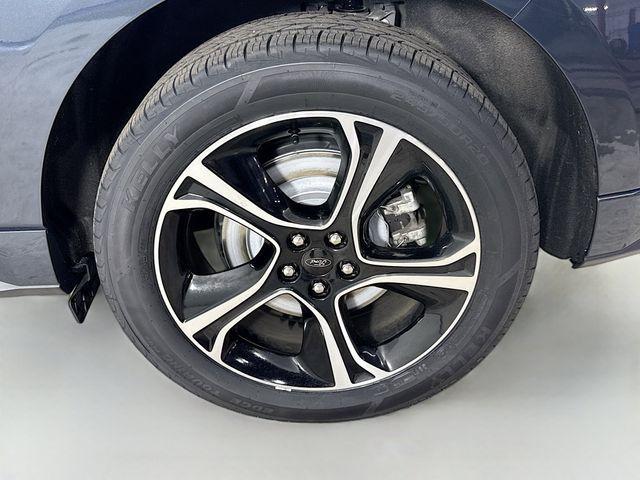 Photo of 2022 Stone Blue Metallic Ford Edge