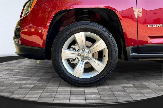 Photo of 2016 Deep Cherry Red Crystal Pearlcoat Jeep Compass