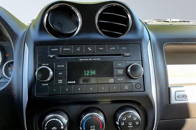 Photo of 2016 Deep Cherry Red Crystal Pearlcoat Jeep Compass