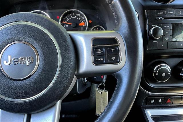 Photo of 2016 Deep Cherry Red Crystal Pearlcoat Jeep Compass
