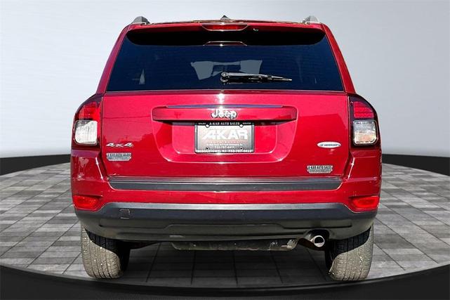 Photo of 2016 Deep Cherry Red Crystal Pearlcoat Jeep Compass