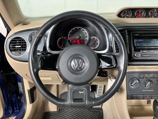 Photo of 2013 Blue Metallic Volkswagen Beetle