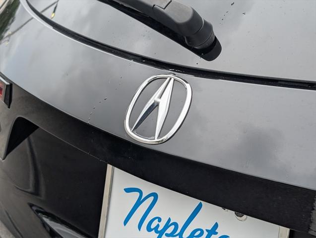 Photo of 2024 Majestic Black Pearl Acura MDX