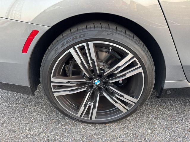 Photo of 2024 Oxide Grey Metallic BMW 740