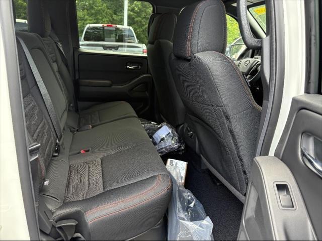 Photo of 2025 Glacier White Nissan Frontier