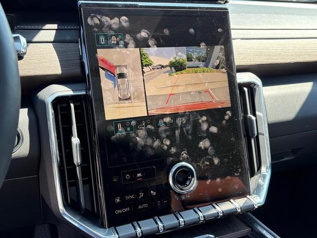 Photo of 2024 Volcanic Red Tintcoat GMC Acadia