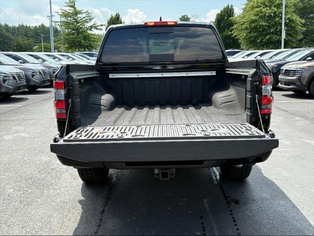 Photo of 2025 Super Black Nissan Frontier
