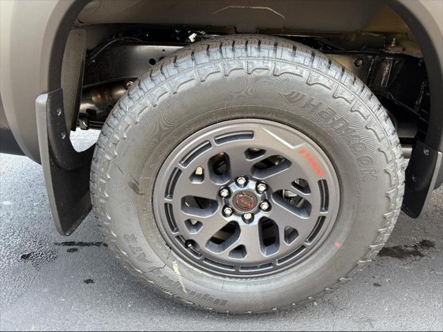 Photo of 2025 Super Black Nissan Frontier