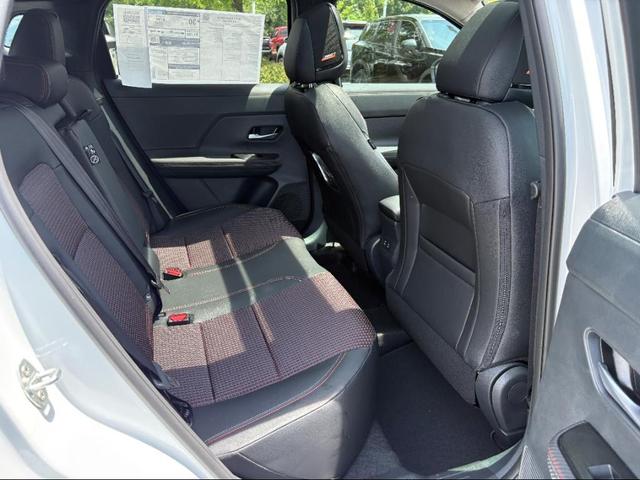 Photo of 2025 Aspen White Tricoat/Super Black Nissan Kicks
