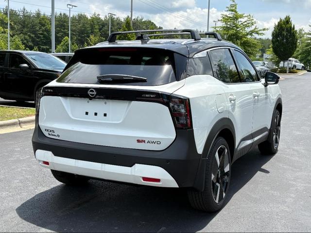 Photo of 2025 Aspen White Tricoat/Super Black Nissan Kicks