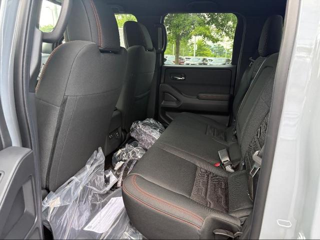 Photo of 2025 Boulder Gray Pearl Nissan Frontier