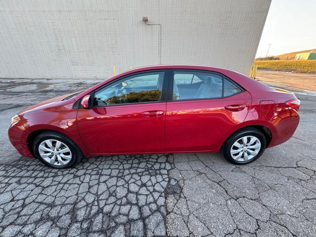 Photo of 2015 Barcelona Red Metallic Toyota Corolla