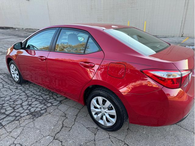 Photo of 2015 Barcelona Red Metallic Toyota Corolla