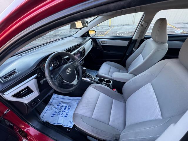 Photo of 2015 Barcelona Red Metallic Toyota Corolla