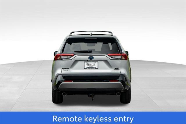 Photo of 2020 Silver Sky Metallic w/Midnight Black Roof Toyota RAV4 Hybrid