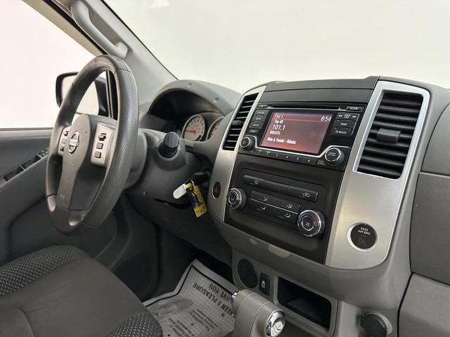 Photo of 2015 Lava Red Nissan Frontier